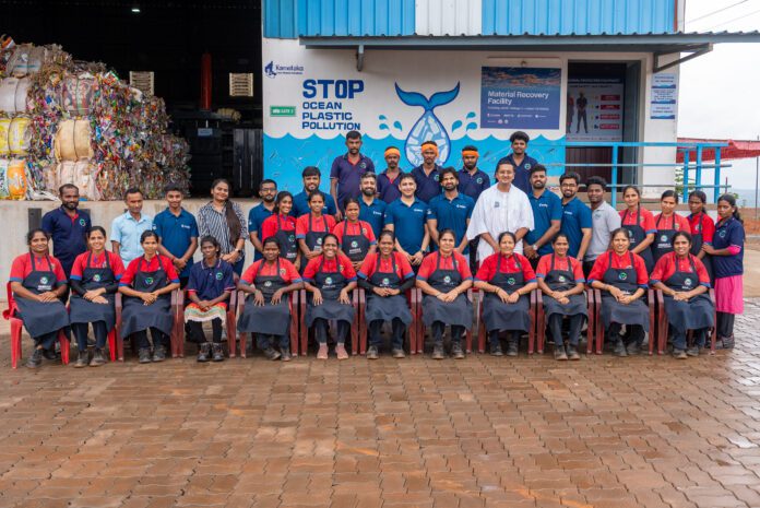 Shivam Agarwal, VP - Strategy, Sattva Group and Aditya Siroya, Co-Founder and Advisor, rePurpose Global with the volunteers and waste workers at the Material Recovery Facility